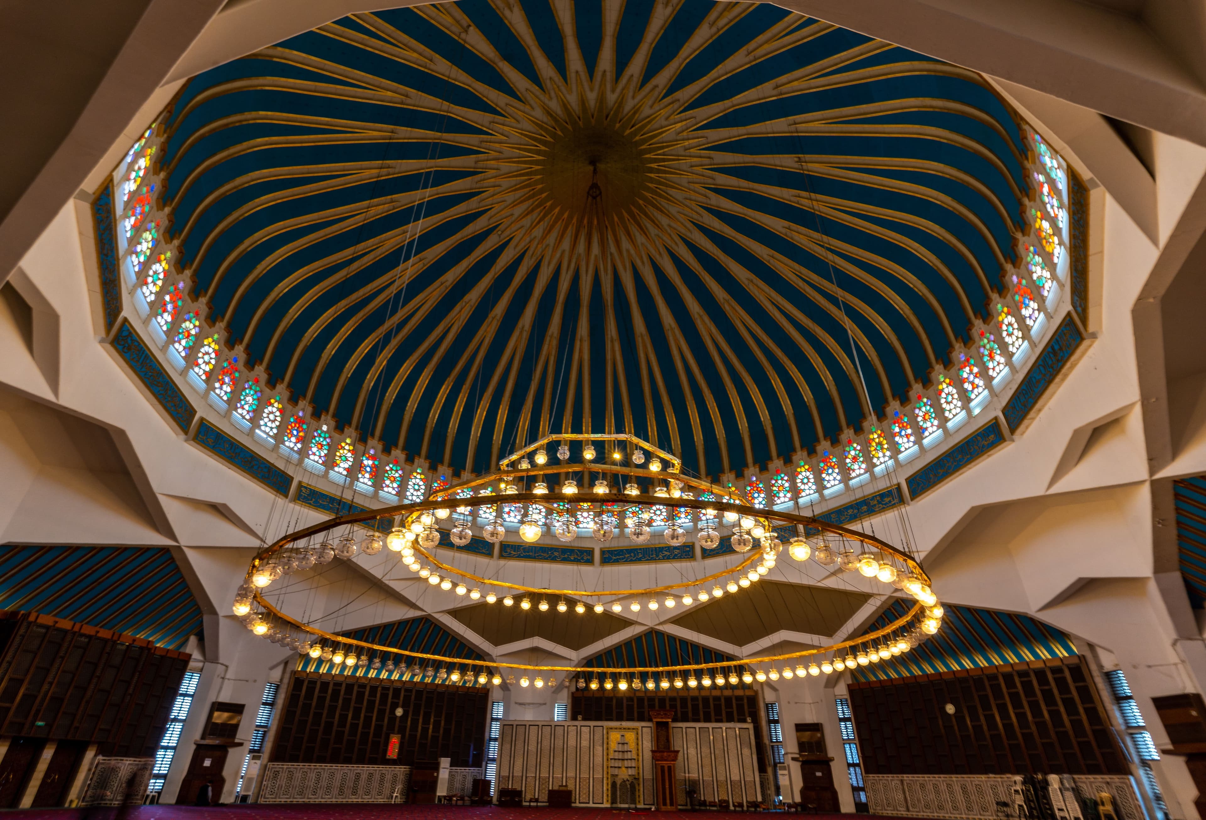 Stunning view of the ornate dome inside King Abdullah I Mosque in Amman, Jordan.