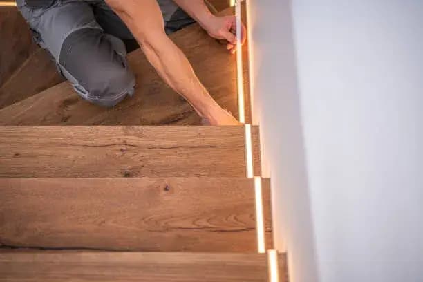 Installation of led lighting on stairs.